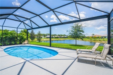 This newly built, elegant pool home backs to a serene lake on Bent Pine Golf Club in Florida - for sale on GolfHomes.com, golf home, golf lot