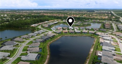 This newly built, elegant pool home backs to a serene lake on Bent Pine Golf Club in Florida - for sale on GolfHomes.com, golf home, golf lot