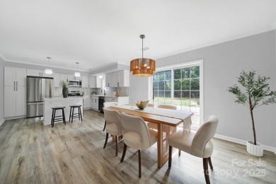 Welcome to this stunning 3-bedroom, 2-bathroom home nestled on on Rock Hill Country Club in South Carolina - for sale on GolfHomes.com, golf home, golf lot