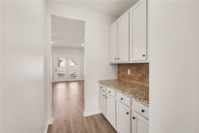 Elegant Lakefront Living with Golf Course Scenery! Step into on Durham Lakes Country Club in Georgia - for sale on GolfHomes.com, golf home, golf lot