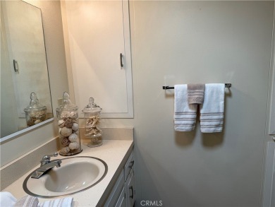 This delightful 2 bedroom 1 bathroom home features a spacious on Leisure World Seal Beach Golf Course in California - for sale on GolfHomes.com, golf home, golf lot