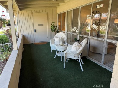 This delightful 2 bedroom 1 bathroom home features a spacious on Leisure World Seal Beach Golf Course in California - for sale on GolfHomes.com, golf home, golf lot