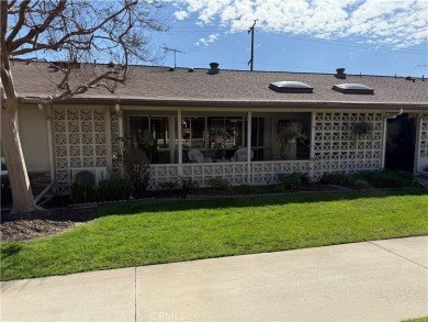 This delightful 2 bedroom 1 bathroom home features a spacious on Leisure World Seal Beach Golf Course in California - for sale on GolfHomes.com, golf home, golf lot