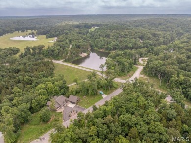 Less than 2 years old, this expanded custom cottage floorplan on Innsbrook Resort Golf Course in Missouri - for sale on GolfHomes.com, golf home, golf lot
