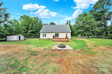 Welcome to this stunning 3-bedroom, 2-bathroom home nestled on on Rock Hill Country Club in South Carolina - for sale on GolfHomes.com, golf home, golf lot