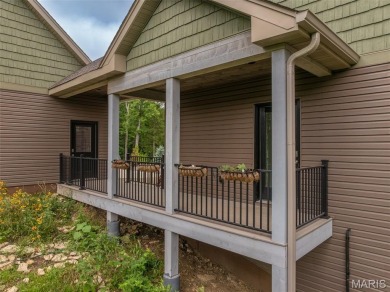 Less than 2 years old, this expanded custom cottage floorplan on Innsbrook Resort Golf Course in Missouri - for sale on GolfHomes.com, golf home, golf lot