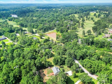 Welcome to this stunning 3-bedroom, 2-bathroom home nestled on on Rock Hill Country Club in South Carolina - for sale on GolfHomes.com, golf home, golf lot