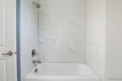 Stunning Brand-New Construction 3 Bedroom 2 Bathroom with bonus on Southern Woods Golf Club in Florida - for sale on GolfHomes.com, golf home, golf lot