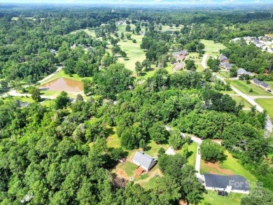 Welcome to this stunning 3-bedroom, 2-bathroom home nestled on on Rock Hill Country Club in South Carolina - for sale on GolfHomes.com, golf home, golf lot