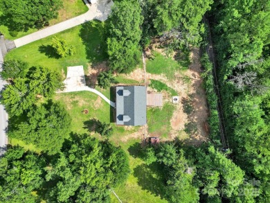 Welcome to this stunning 3-bedroom, 2-bathroom home nestled on on Rock Hill Country Club in South Carolina - for sale on GolfHomes.com, golf home, golf lot