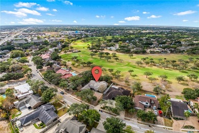 Welcome to this exceptional 4,667-square-foot residence located on Corpus Christi Country Club Golf Course in Texas - for sale on GolfHomes.com, golf home, golf lot