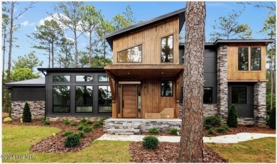 Nestled on a quiet culdesac, this contemporary home constructed on Forest Creek Golf Club  in North Carolina - for sale on GolfHomes.com, golf home, golf lot