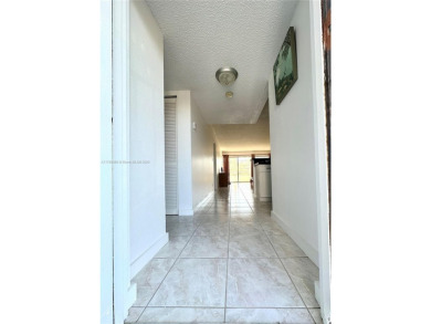 Beautiful, spacious and bright, this 1 1/2  fully furnished on Colony West Country Club in Florida - for sale on GolfHomes.com, golf home, golf lot