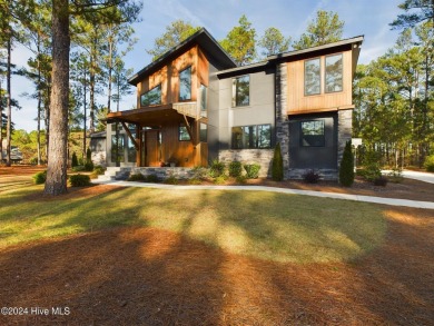 Nestled on a quiet culdesac, this contemporary home constructed on Forest Creek Golf Club  in North Carolina - for sale on GolfHomes.com, golf home, golf lot