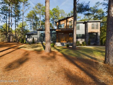 Nestled on a quiet culdesac, this contemporary home constructed on Forest Creek Golf Club  in North Carolina - for sale on GolfHomes.com, golf home, golf lot