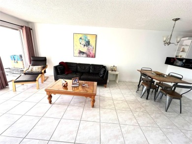 Beautiful, spacious and bright, this 1 1/2  fully furnished on Colony West Country Club in Florida - for sale on GolfHomes.com, golf home, golf lot