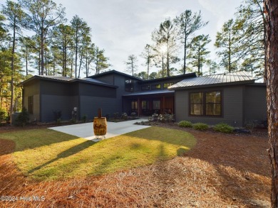 Nestled on a quiet culdesac, this contemporary home constructed on Forest Creek Golf Club  in North Carolina - for sale on GolfHomes.com, golf home, golf lot