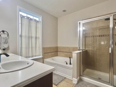 Stunning Southwood home featuring 4 bedrooms plus a loft, 2.5 on Southwood Golf Club in Florida - for sale on GolfHomes.com, golf home, golf lot