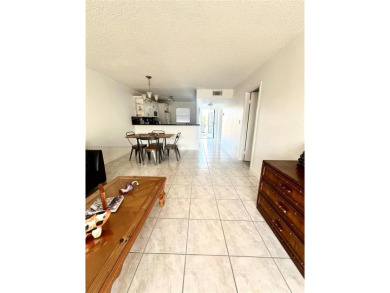 Beautiful, spacious and bright, this 1 1/2  fully furnished on Colony West Country Club in Florida - for sale on GolfHomes.com, golf home, golf lot