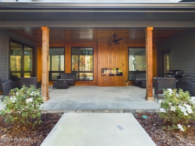 Nestled on a quiet culdesac, this contemporary home constructed on Forest Creek Golf Club  in North Carolina - for sale on GolfHomes.com, golf home, golf lot