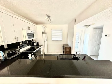 Beautiful, spacious and bright, this 1 1/2  fully furnished on Colony West Country Club in Florida - for sale on GolfHomes.com, golf home, golf lot
