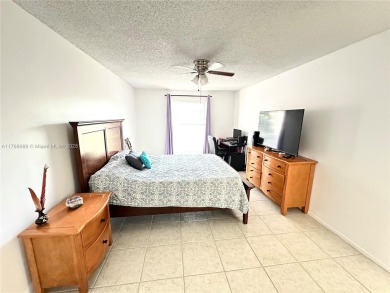 Beautiful, spacious and bright, this 1 1/2  fully furnished on Colony West Country Club in Florida - for sale on GolfHomes.com, golf home, golf lot