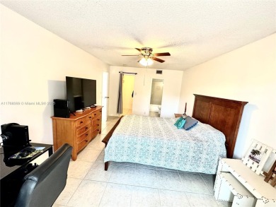 Beautiful, spacious and bright, this 1 1/2  fully furnished on Colony West Country Club in Florida - for sale on GolfHomes.com, golf home, golf lot