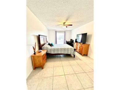Beautiful, spacious and bright, this 1 1/2  fully furnished on Colony West Country Club in Florida - for sale on GolfHomes.com, golf home, golf lot