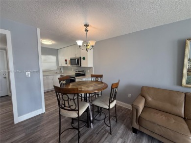 Beautifully upgraded 1 bedroom 1 bath  condo with shaker on Sunrise Lakes Phase III in Florida - for sale on GolfHomes.com, golf home, golf lot