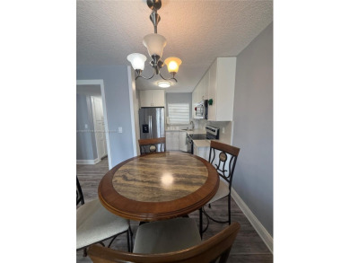 Beautifully upgraded 1 bedroom 1 bath  condo with shaker on Sunrise Lakes Phase III in Florida - for sale on GolfHomes.com, golf home, golf lot