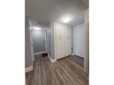 Beautifully upgraded 1 bedroom 1 bath  condo with shaker on Sunrise Lakes Phase III in Florida - for sale on GolfHomes.com, golf home, golf lot