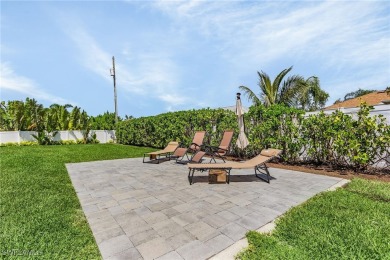 Welcome to refined Florida living. This immaculately clean on Royal Tee Country Club in Florida - for sale on GolfHomes.com, golf home, golf lot