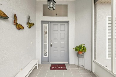 Experience the pinnacle of golf course living in this on Caloosa Greens Executive Golf Course in Florida - for sale on GolfHomes.com, golf home, golf lot