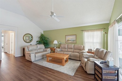 Experience the pinnacle of golf course living in this on Caloosa Greens Executive Golf Course in Florida - for sale on GolfHomes.com, golf home, golf lot