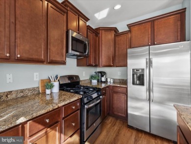 This beautiful three-story townhouse in the highly sought-after on Plantation Lakes Golf and Country Club in Delaware - for sale on GolfHomes.com, golf home, golf lot