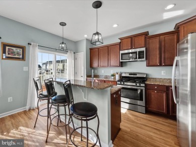 This beautiful three-story townhouse in the highly sought-after on Plantation Lakes Golf and Country Club in Delaware - for sale on GolfHomes.com, golf home, golf lot