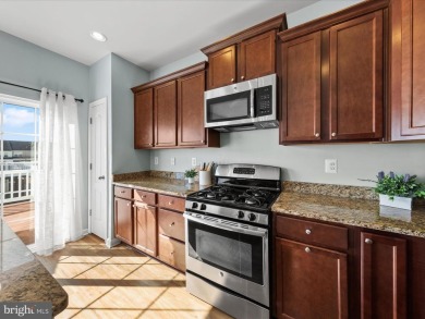 This beautiful three-story townhouse in the highly sought-after on Plantation Lakes Golf and Country Club in Delaware - for sale on GolfHomes.com, golf home, golf lot