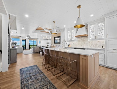 Welcome to a masterfully reimagined two-bedroom, 2.5-bath on Longboat Key Golf Club Resort in Florida - for sale on GolfHomes.com, golf home, golf lot