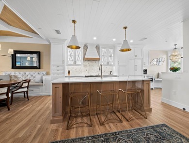 Welcome to a masterfully reimagined two-bedroom, 2.5-bath on Longboat Key Golf Club Resort in Florida - for sale on GolfHomes.com, golf home, golf lot