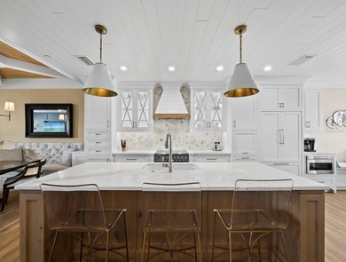 Welcome to a masterfully reimagined two-bedroom, 2.5-bath on Longboat Key Golf Club Resort in Florida - for sale on GolfHomes.com, golf home, golf lot