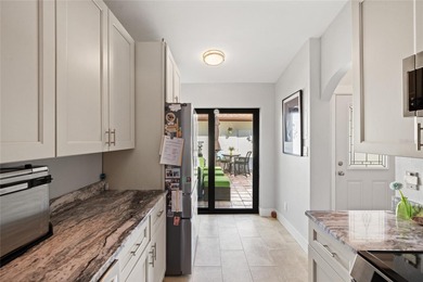 *WELCOME TO THIS BEAUTIFUL VILLA IN HIGHLY DESIRABLE FEATHER on Feather Sound Country Club in Florida - for sale on GolfHomes.com, golf home, golf lot