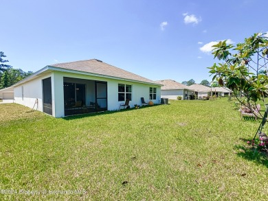 Beautifully maintained 4 bedroom, 2 bathroom home in the gated on Hernando Oaks Golf and Country Club in Florida - for sale on GolfHomes.com, golf home, golf lot