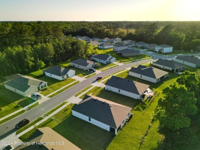 Beautifully maintained 4 bedroom, 2 bathroom home in the gated on Hernando Oaks Golf and Country Club in Florida - for sale on GolfHomes.com, golf home, golf lot