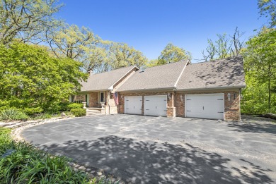 This custom 6 bedroom, 4 bath home is nestled deep into a wooded on Prestwick Country Club in Illinois - for sale on GolfHomes.com, golf home, golf lot
