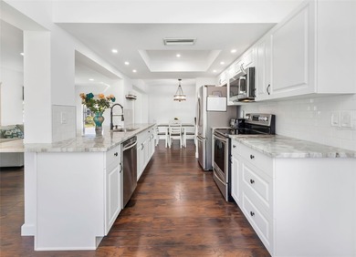 Welcome to your new home in The Mainlands of Tamarac by the on Mainlands Golf Club in Florida - for sale on GolfHomes.com, golf home, golf lot