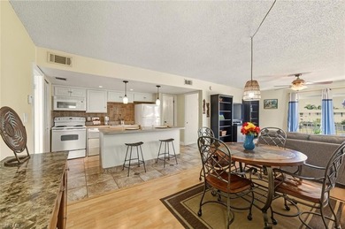 Resort style living nestled in the heart of Naples a few short on The Glades Golf and Country Club in Florida - for sale on GolfHomes.com, golf home, golf lot