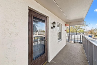 Beautifully Updated 2-Bedroom, 2-Bath End Unit in Cordova Greens on Bayou Golf Club in Florida - for sale on GolfHomes.com, golf home, golf lot