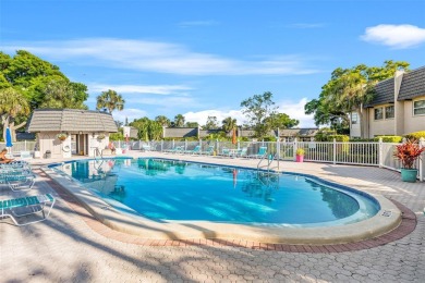 Beautifully Updated 2-Bedroom, 2-Bath End Unit in Cordova Greens on Bayou Golf Club in Florida - for sale on GolfHomes.com, golf home, golf lot