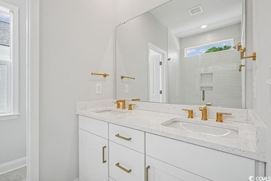 Fall in love with this 3-bedroom, 2.5-bath home with a spacious on Tidewater Golf Club and Plantation in South Carolina - for sale on GolfHomes.com, golf home, golf lot