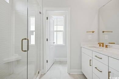 Fall in love with this 3-bedroom, 2.5-bath home with a spacious on Tidewater Golf Club and Plantation in South Carolina - for sale on GolfHomes.com, golf home, golf lot